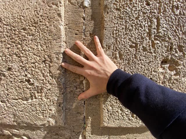 Placing notes in the Western Wall Jerusalem