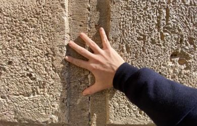 Placing notes in the Western Wall Jerusalem